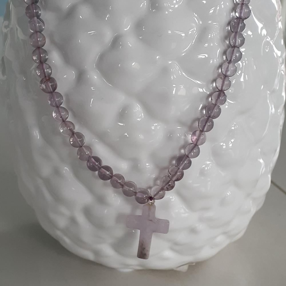 # Purple bead and quartz stone cross necklace